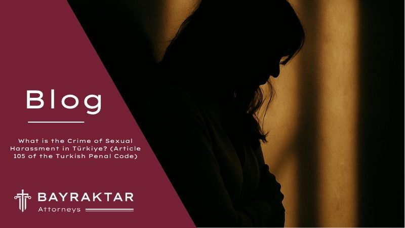["A silhouette of a young woman standing alone in a dimly lit urban setting, symbolizing the emotional impact of sexual harassment."]