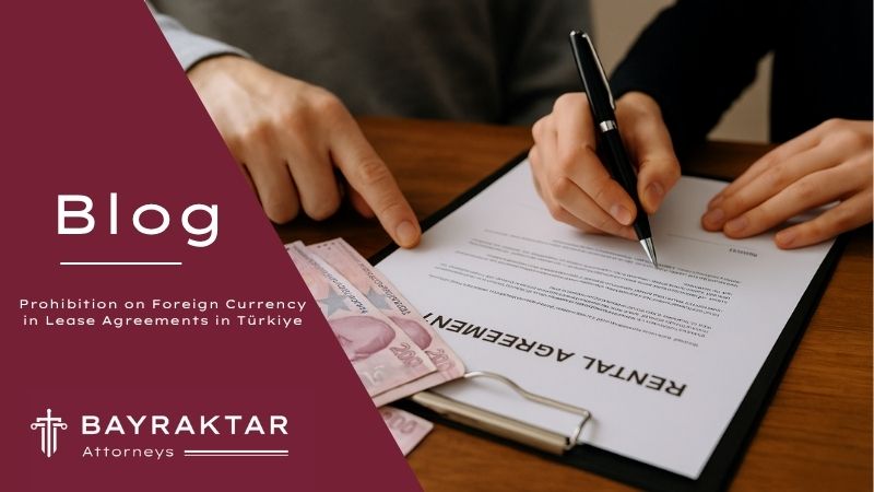 A real photo showing two people signing a rental or business contract in an office setting, symbolizing the legal requirement to use Turkish Lira in agreements.