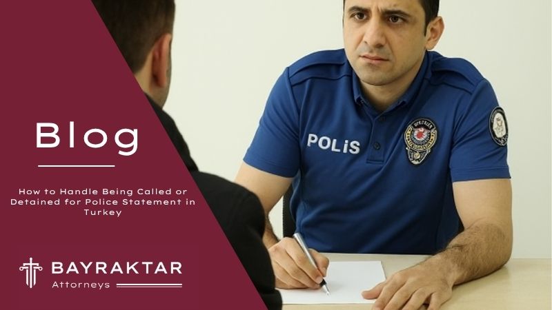 A Turkish police officer in a blue uniform interrogates a suspect seated across a table in a plain room.