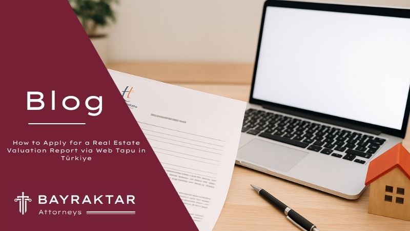 ["A digital photograph showcases a workspace centered around a laptop displaying Türkiye’s Web Tapu system, with legal documents and a Turkish ID card on the desk."]