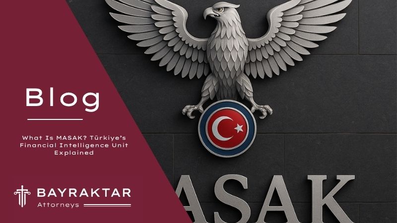 ["A high-resolution photograph of the MASAK (Financial Crimes Investigation Board) emblem on a dark stone wall in Türkiye, featuring a double-headed eagle with the Turkish flag symbol beneath it."]